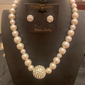 Traci Lynn Cream and Silver Necklace with Pendant